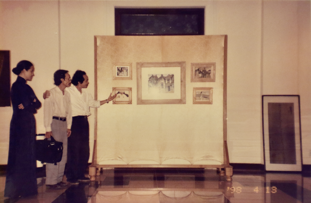 Nguyen Trong Tao — Vietnamese Author, Art Critic, Musician; Doan Tuyen Chau — Journalist and Boi Tran at Boi Tran Art Gallery's Grand Opening, Saigon Morin Hotel, 30 Le Loi, Hue, 1998.
